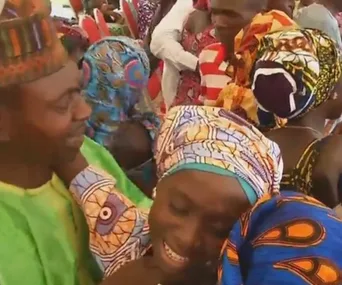 Families embrace in joy and tears celebrating the reunion with kidnapped Nigerian schoolgirls.