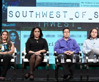 Four individuals sitting on stage, backdrop displays "SOUTHWEST OF SALEM".