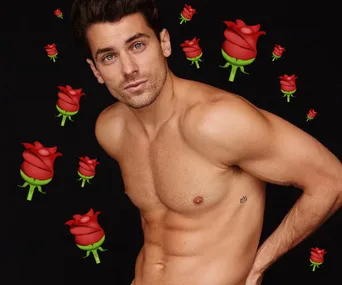Muscular man posing shirtless with rose emojis on a black background.