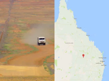 A truck on a dusty outback road in Queensland beside a map showing location in Queensland, Australia.