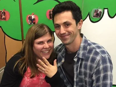 Eric Hernandez proposes with book to Melanie Goldsmith 