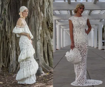 Two models wearing intricate wedding dresses made from toilet paper, one by a tree, the other in a colonnade walkway.