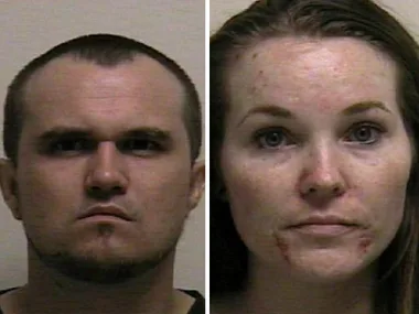 Mugshots of a man and woman side by side, with blank expressions and facial blemishes.