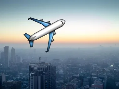 Aerial view of a cityscape at sunrise with a stylized airplane graphic overlay.
