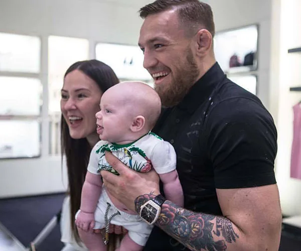 Conor McGregor, Dee Devlin and Conor Jack McGregor