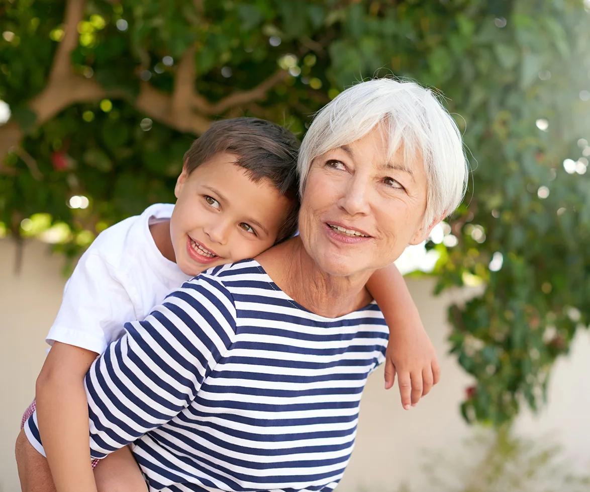 Older woman with little boy.