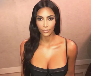 Kim Kardashian poses naked in a tree – and of course everyone has an opinion!