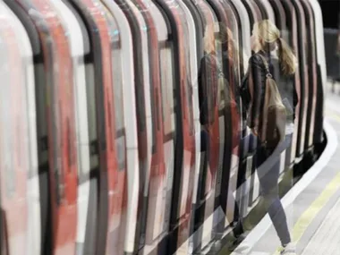 A person boards a train with motion blur, emphasizing the sense of anxiety while using public transport.