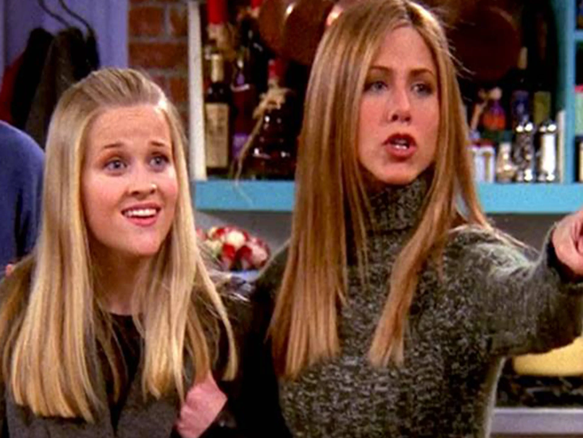 Rachel and Jill Green in a kitchen setting, with Rachel pointing and Jill looking surprised.