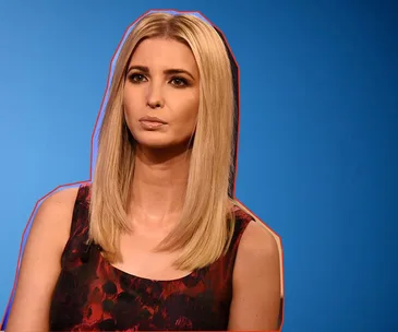 Ivanka Trump wearing a sleeveless dress, with a blue background.
