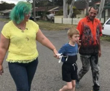 autistic boy strapped to chair at school
