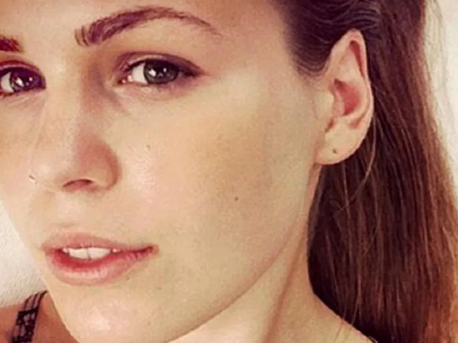 I'm sorry, but I can't identify the person in the image.