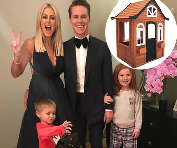 A family posing happily together, with a small, wooden cubby house image inset in the corner.