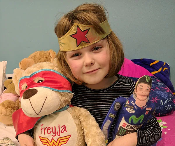 5 year-old Freyja with her toys