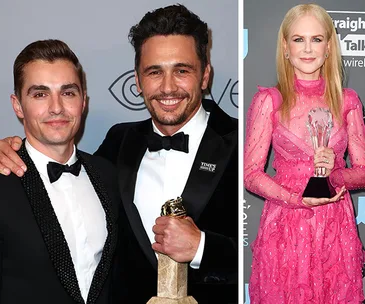 Two men in tuxedos holding an award; a woman in a pink dress holding a trophy at a formal event.