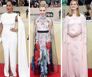 Three women in elegant gowns on the red carpet at the 2018 SAG Awards; wearing white, floral and pink dresses respectively.
