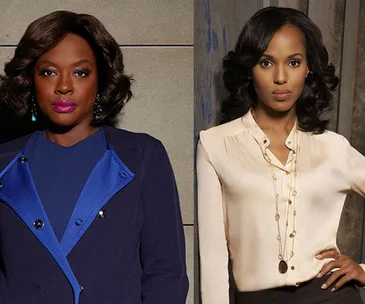 Two women standing side by side, one in a navy coat, the other in a white blouse, both with confident expressions.