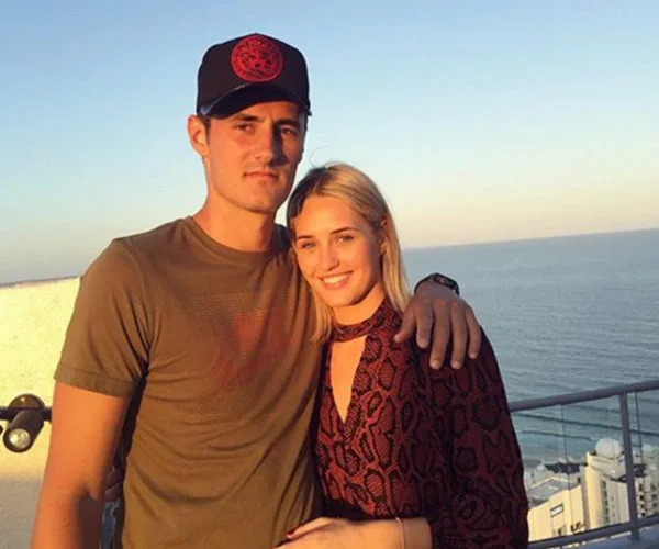 Bernard Tomic and Emma Blake-Hahnel