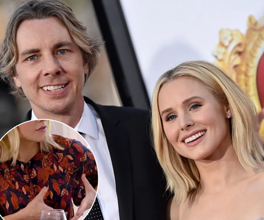 A smiling couple at a formal event with an inset showing a close-up of a woman in a patterned blouse talking.