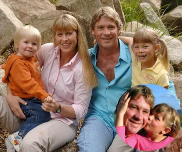 A family sitting outdoors, smiling together, includes two adults and two children; inset shows a child kissing an adult's cheek.