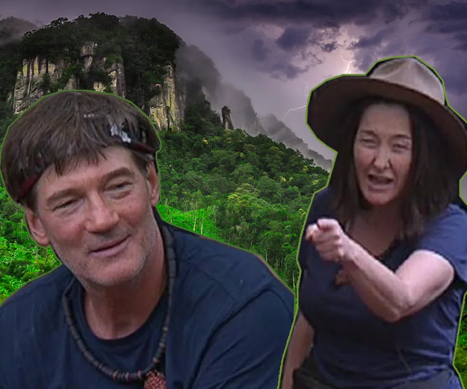 Two people in a jungle environment, one appearing upset and pointing, the other listening.