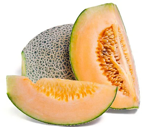 Slices of rockmelon (cantaloupe) showing the orange flesh and seeds, with one whole fruit in the background.