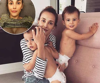 Woman holding two diaper-clad toddlers on a sofa, with an inset selfie showing a relaxed expression.