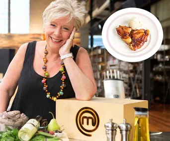 A woman in a kitchen with cooking ingredients, a MasterChef box, and a small image of tarte Tatin with ice cream.