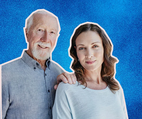 Older man and younger woman smiling, standing against a blue textured background.