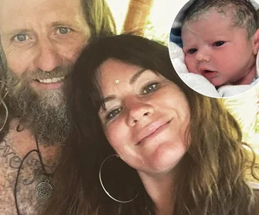 Couple smiling with a newborn baby inset, all appearing content and happy.