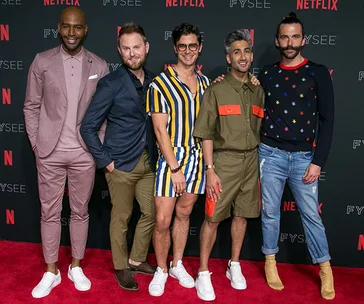 The Fab Five from Queer Eye pose together on the red carpet at a Netflix FYSEE event.