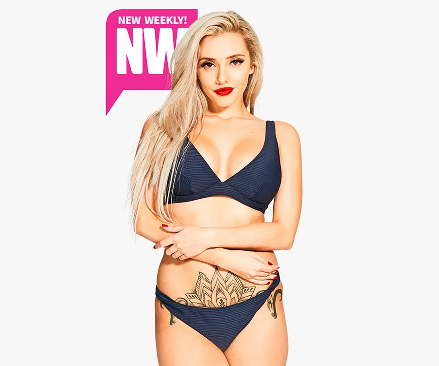 Blonde woman in blue bikini with tattoo, posing confidently against "NW" magazine logo on white background.