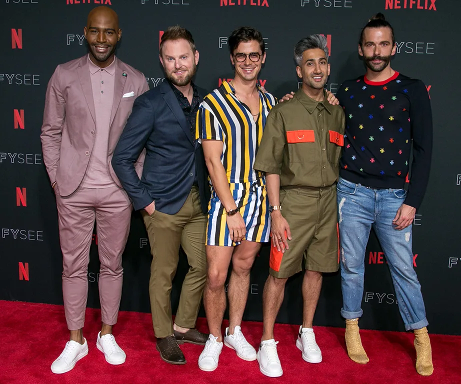 The Fab Five from "Queer Eye" Season 2 on the red carpet at a Netflix event, dressed in stylish outfits.