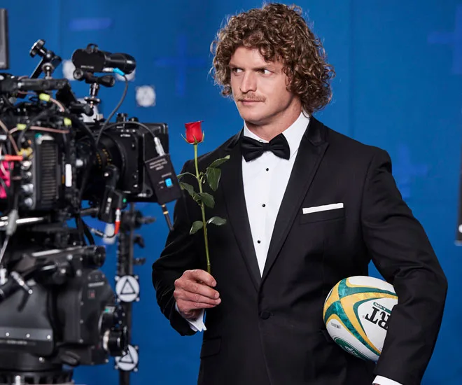 Nick 'Honey Badger' Cummins shoots The Bachelor commercials