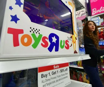 Customer shopping in Toys R Us store