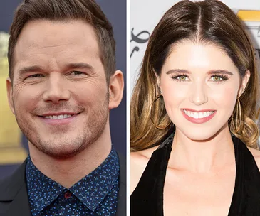 Two smiling individuals side-by-side, one man and one woman, facing forward.