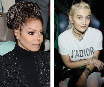 Two women seated; one with braided hair and dark attire, the other with blonde hair and a white "J'ADIOR" t-shirt.