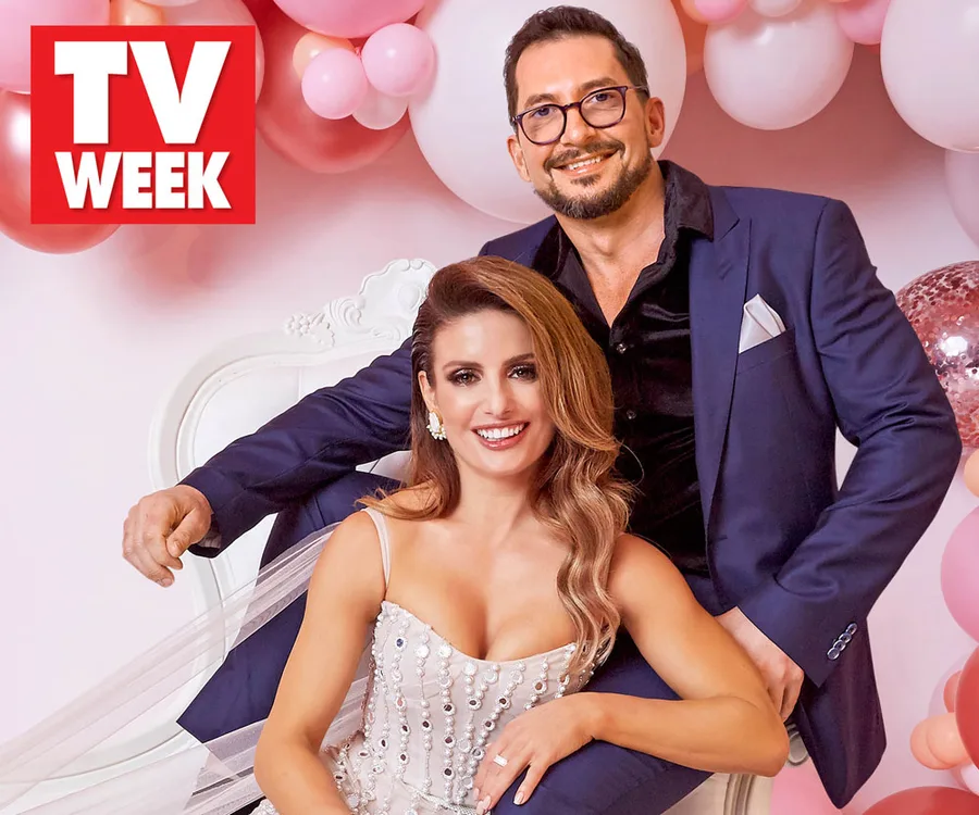 Couple in formal attire smiling, surrounded by pink and white balloons with "TV WEEK" logo in the top left corner.