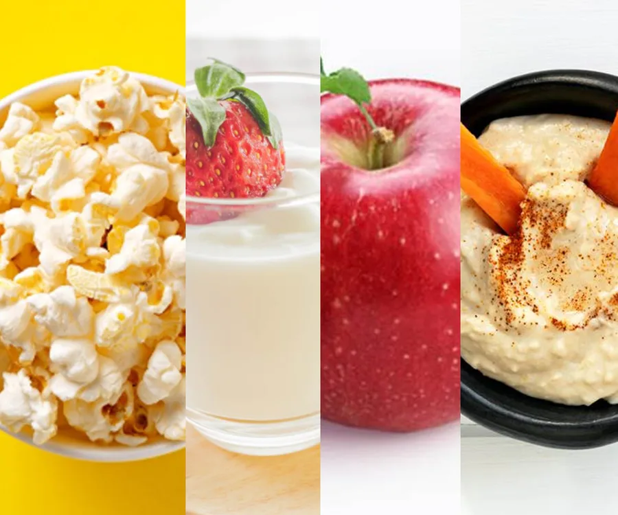 A collage of low-calorie snacks: popcorn, yogurt with strawberry, an apple, and hummus with carrot sticks.