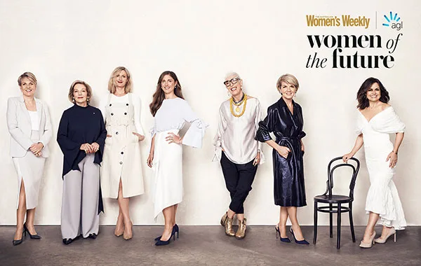 Women posing together at the "Women of the Future" event, wearing stylish attire, against a light background with text.