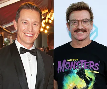 Two men side-by-side; left in a tuxedo, right in glasses and a "Famous Monsters" T-shirt, both smiling.