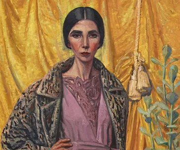 Portrait of a woman with dark hair, wearing a leopard print coat over a pink dress, against a gold draped background.