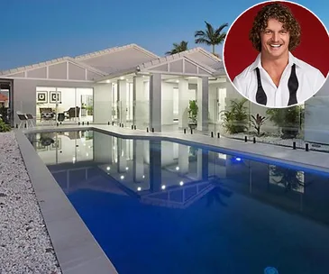 Luxury modern home with a large pool at dusk; inset shows a smiling man with curly hair and a white shirt.