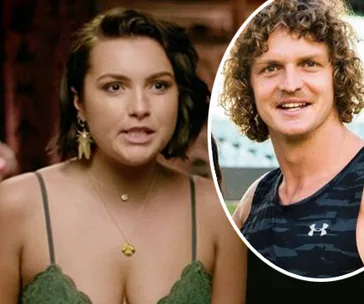 A woman in a green top speaks, with an inset of a smiling man in a black tank top beside her.