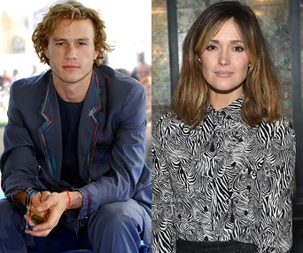 Two individuals side by side; one wearing a suit and the other in a patterned blouse, both looking at the camera.