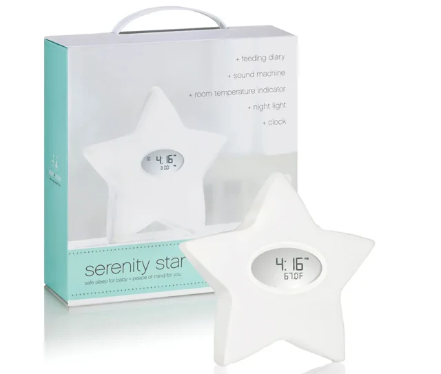 Star-shaped digital clock and temperature display with "Serenity Star" packaging for nursery use.