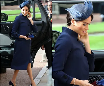 A woman in a navy blue coat and matching hat steps out of a vehicle at a formal event.