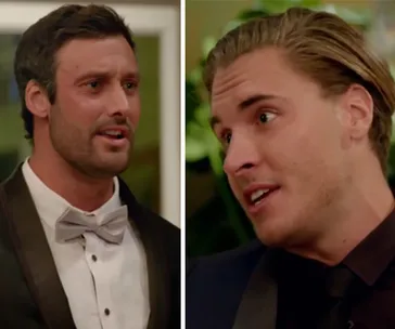 Two men in formal wear having a conversation, one in a bow tie, the other with slicked-back hair.