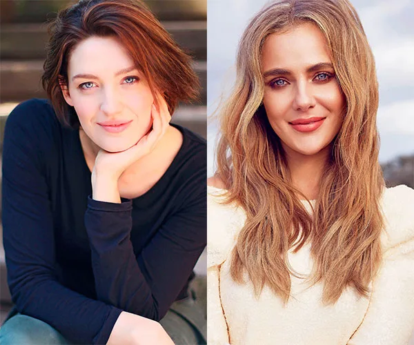 Two women smiling, one with short dark hair wearing black, the other with long blonde hair wearing a light top.