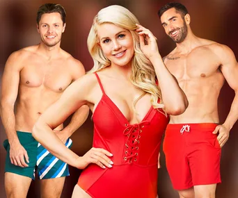 Bachelorette in red swimsuit with two shirtless men in colorful swim trunks standing beside her, all smiling at the camera.
